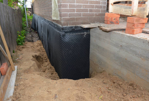 Happy homeowners after waterproofing job in National Park